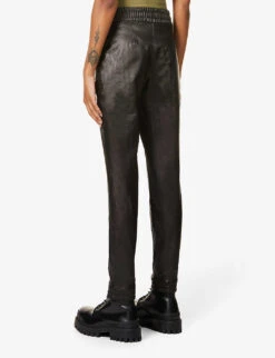 Spanx Leather Like Tapered-leg Mid-rise Stretch Faux-leather Jogging Bottoms 10 Spanx Leather Like Tapered-leg Mid-rise Stretch Faux-leather Jogging Bottoms -Sweaty Betty Store R03838562 NOIRBLACK ALT03