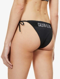 Calvin Klein Intense Power Logo-print High-rise Bikini Bottoms 10 Calvin Klein Intense Power Logo-print High-rise Bikini Bottoms -Sweaty Betty Store R03874197 PVHBLACK ALT03