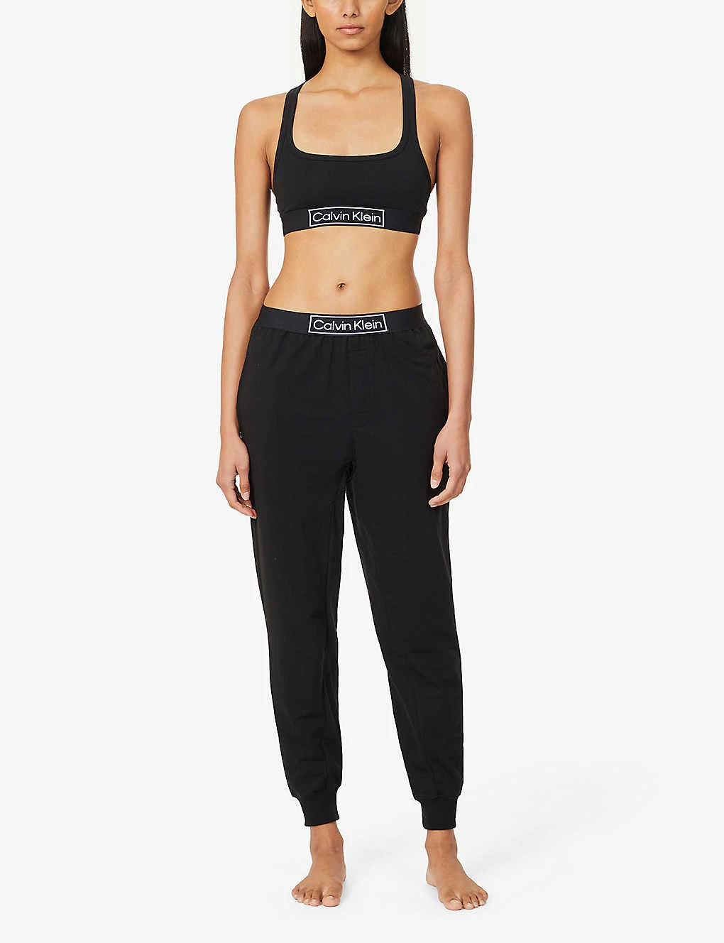 Calvin Klein Reimagined Logo-band Relaxed-fit Mid-rise Cotton-recycled Polyester Blend Jogging Bottoms 4 Calvin Klein Reimagined Logo-band Relaxed-fit Mid-rise Cotton-recycled Polyester Blend Jogging Bottoms - Image 2