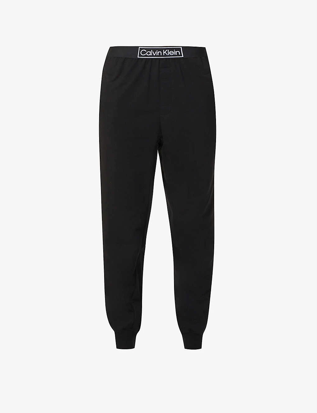 Calvin Klein Reimagined Logo-band Relaxed-fit Mid-rise Cotton-recycled Polyester Blend Jogging Bottoms 3 Calvin Klein Reimagined Logo-band Relaxed-fit Mid-rise Cotton-recycled Polyester Blend Jogging Bottoms