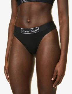 Calvin Klein Reimagine Heritage Logo-print Stretch-cotton Jersey Thong 9 Calvin Klein Reimagine Heritage Logo-print Stretch-cotton Jersey Thong -Sweaty Betty Store R03894454 BLACK ALT02