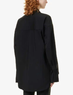 GOOD AMERICAN Tabbed-cuff Loose-fit Cotton-blend Shirt 10 GOOD AMERICAN Tabbed-cuff Loose-fit Cotton-blend Shirt -Sweaty Betty Store R03917092 BLACK001 ALT03