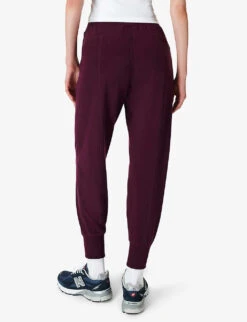 Sweaty Betty Repose Luxe 27 Stretch-fleece Jogging Bottoms 10 Sweaty Betty Repose Luxe 27 Stretch-fleece Jogging Bottoms -Sweaty Betty Store R04074876 PLUMRED ALT03