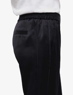 THE KOOPLES Tapered-leg High-rise Satin Jogging Bottoms 11 THE KOOPLES Tapered-leg High-rise Satin Jogging Bottoms -Sweaty Betty Store R04121892 BLA01 ALT04