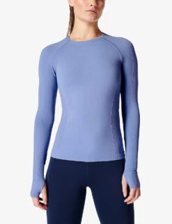 Sweaty Betty Athlete Seamless Workout Long-sleeved Stretch-jersey Top 9 Sweaty Betty Athlete Seamless Workout Long-sleeved Stretch-jersey Top -Sweaty Betty Store R04127201 FLUIDBLUE ALT02