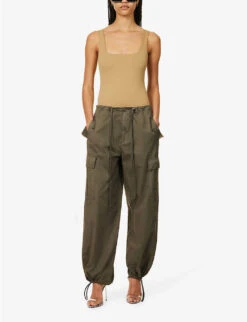 GOOD AMERICAN Parachute Wide-leg Drawstring-hem Cotton Trousers 10 GOOD AMERICAN Parachute Wide-leg Drawstring-hem Cotton Trousers -Sweaty Betty Store R04166623 FATIGUE001 ALT02