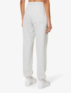 Italic Logo-print Relaxed-fit Stretch-cotton Jogging Bottoms 10 Italic Logo-print Relaxed-fit Stretch-cotton Jogging Bottoms -Sweaty Betty Store R04205136 HEATHERGRAYNAVY ALT03